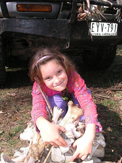 30-One of the Mankyettes shows off her collection of bones collected on the weekend.JPG